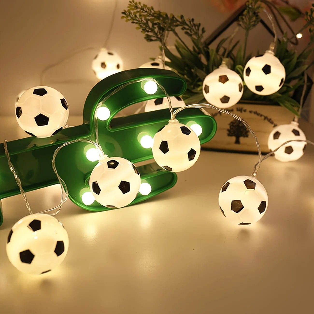 Football Shaped LED String Light, Warm Yellow Soft Glow, Cozy Decoration for Bedroom and Party. Battery Powered, 3Meters with 20 Lights.